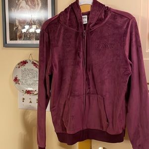 This is like a soft velour sweater with zip up front and front pockets